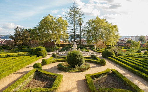 Formal garden with fountain at National Palace of Ajuda, Lisbon.