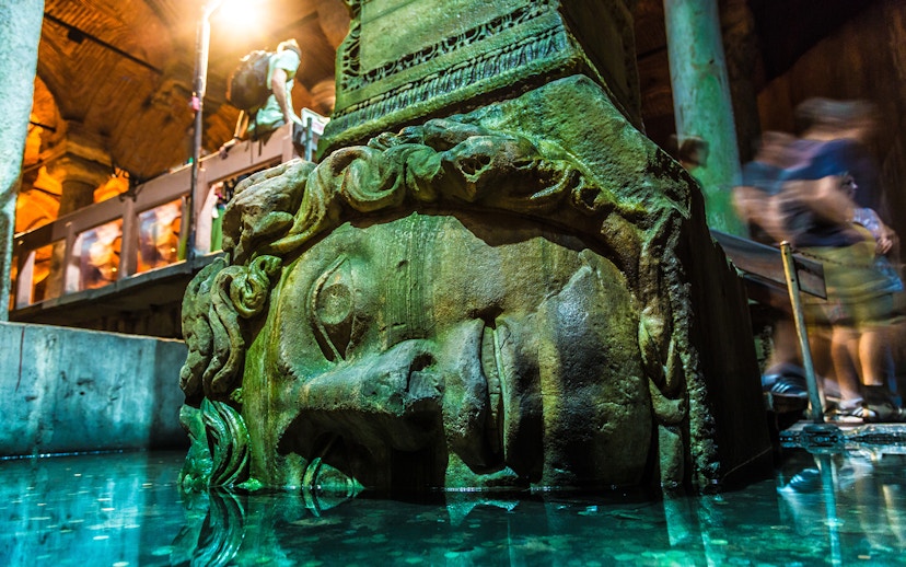 Medusa head column in Basilica Cistern, Istanbul, part of Blue Mosque & Basilica Cistern tour.