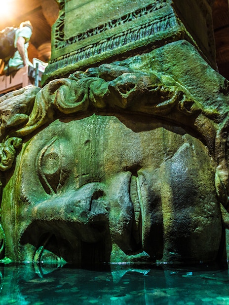 Medusa head column in Basilica Cistern, Istanbul, part of Blue Mosque & Basilica Cistern tour.