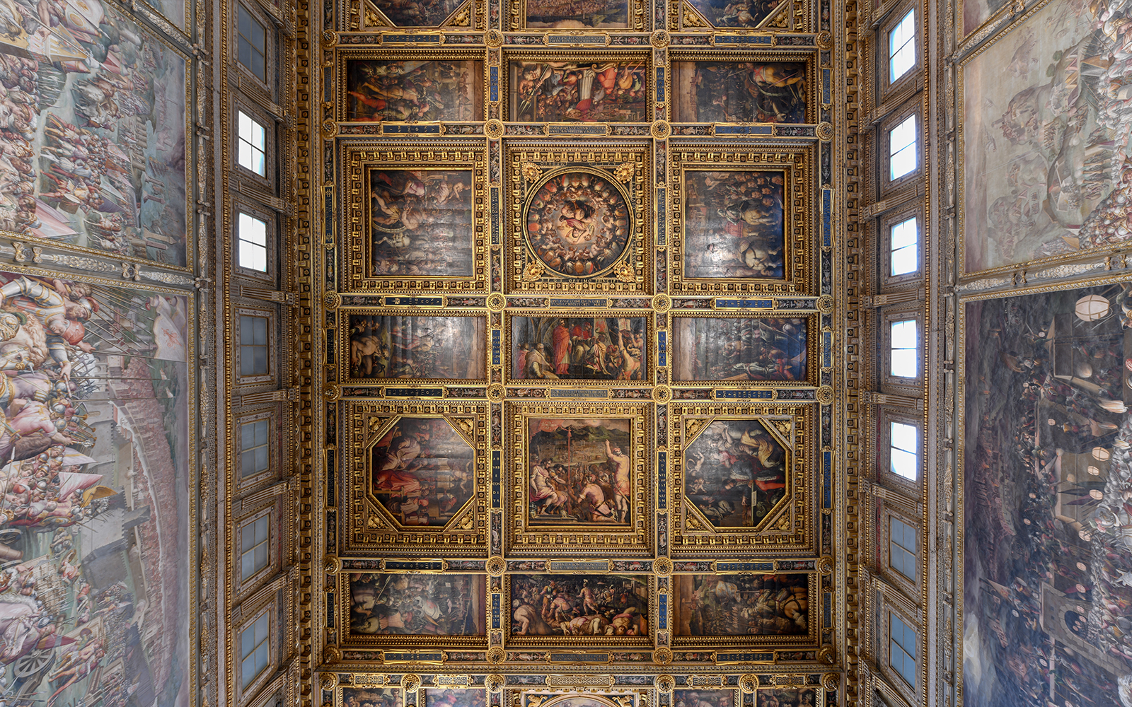 Palazzo Vecchio ornate ceiling with detailed frescoes, Florence, Italy.