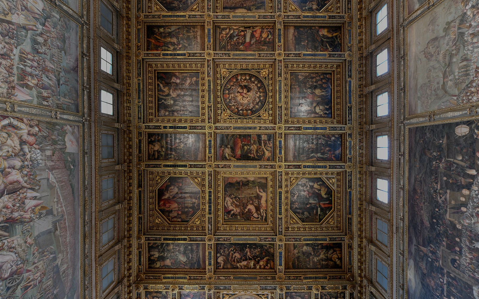 Palazzo Vecchio ornate ceiling with detailed frescoes, Florence, Italy.
