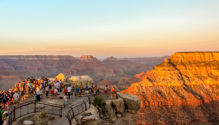 Sunset view at Mather Point, Grand Canyon, USA, highlighting the canyon's vast landscape.