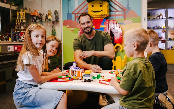 Children building with bricks at Museum of Bricks, Prague.