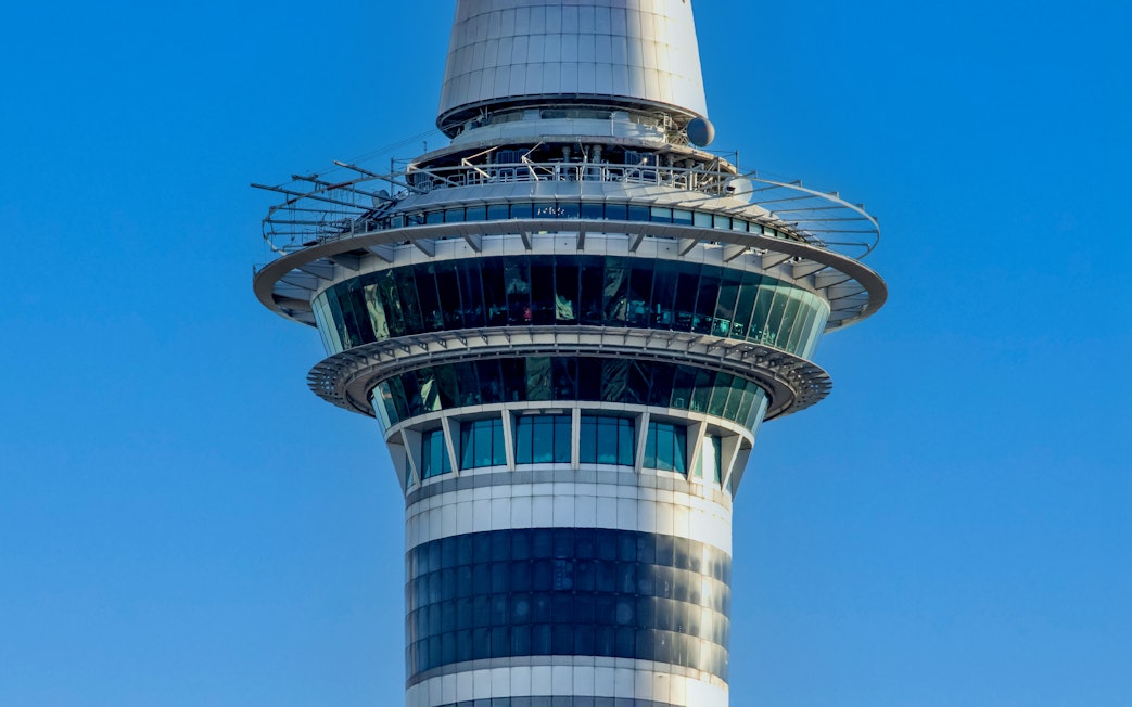 Skytower observation deck against blue sky, Auckland, New Zealand.