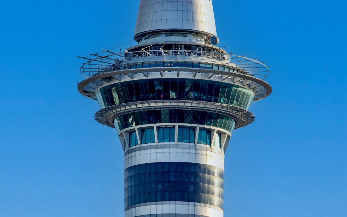 Skytower observation deck against blue sky, Auckland, New Zealand.