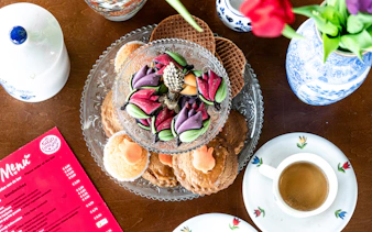 Tulip-themed pastries and coffee at Keukenhof's Tulip Experience tour.