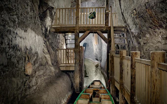 Underground wooden walkway and boat in Bochnia Salt Mine, Krakow.