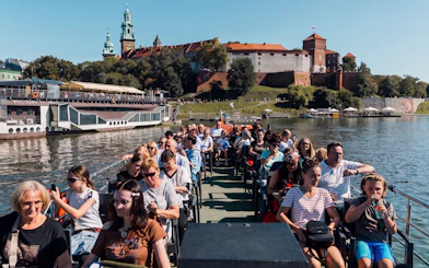 Sightseeing cruise on the Vistula River with Wawel Castle in the background, Krakow.