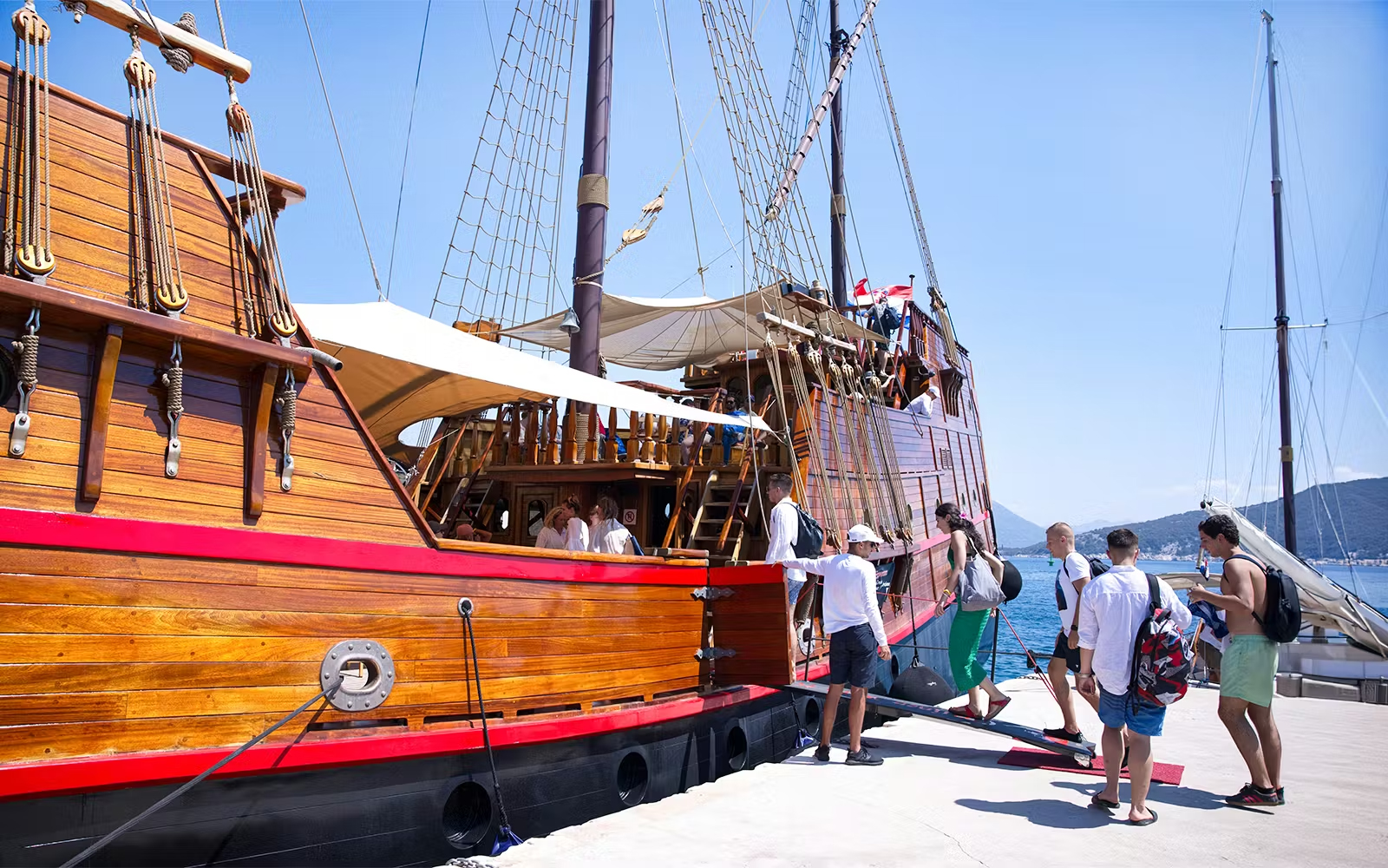 Guests boarding the Karaka ship for Elaphite Islands cruise in Croatia.