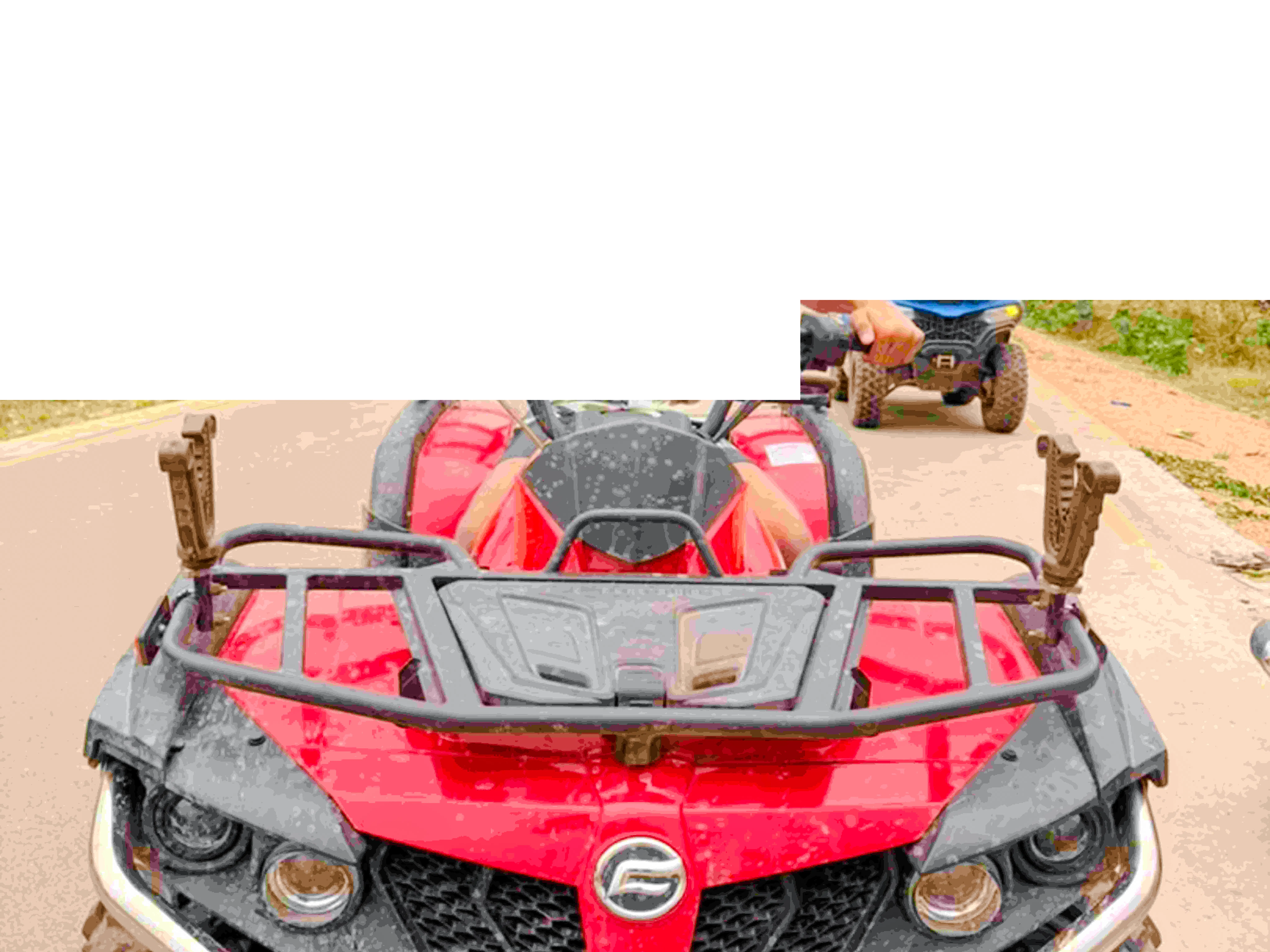 Quad bike on a dirt road during Zanzibar adventure tour.