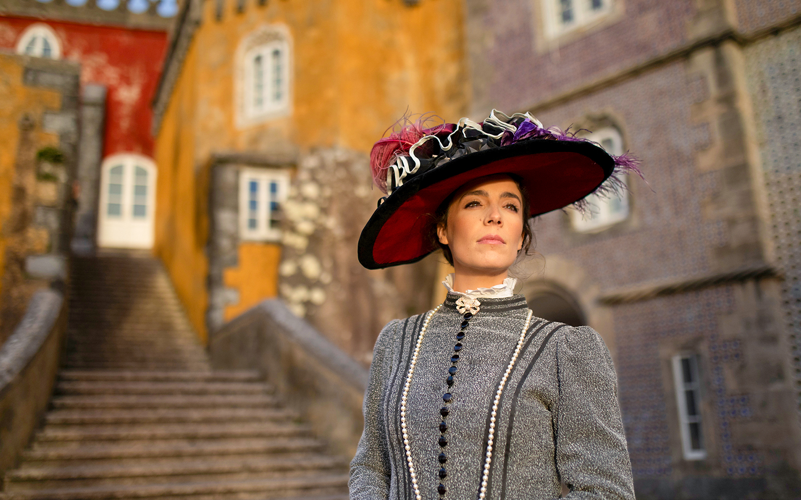 Visitor in period costume at the Palace of Pena, Sintra, Portugal.