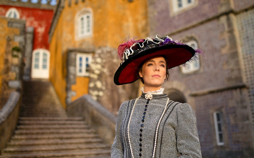 Visitor in period costume at the Palace of Pena, Sintra, Portugal.