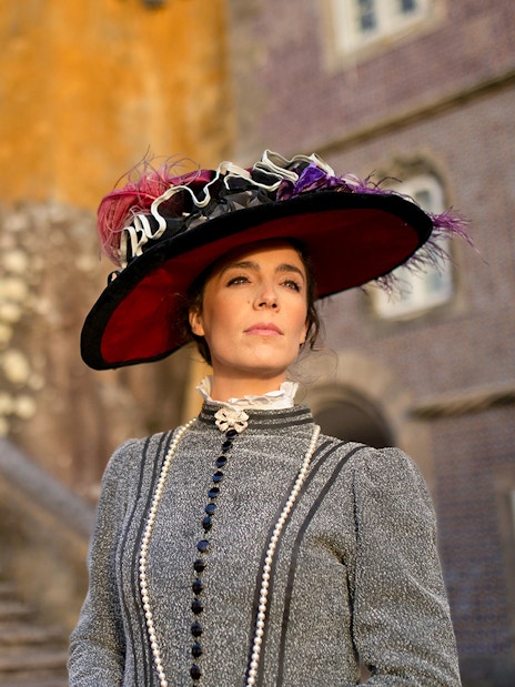 Visitor in period costume at the Palace of Pena, Sintra, Portugal.