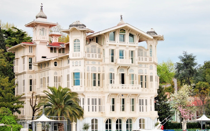 Historic wooden mansion along the Bosphorus on Istanbul sightseeing boat cruise.