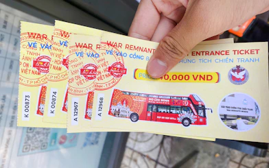Tickets for War Remnants Museum in Ho Chi Minh City held in hand.