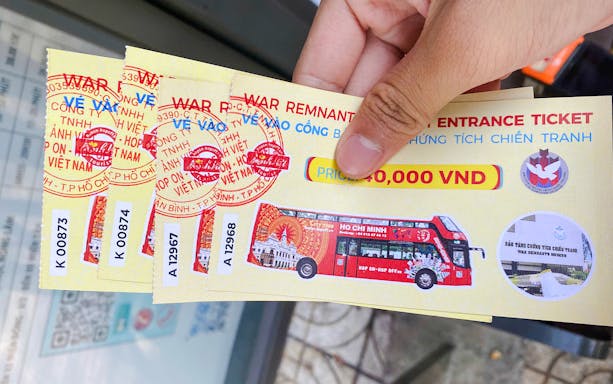 Tickets for War Remnants Museum in Ho Chi Minh City held in hand.