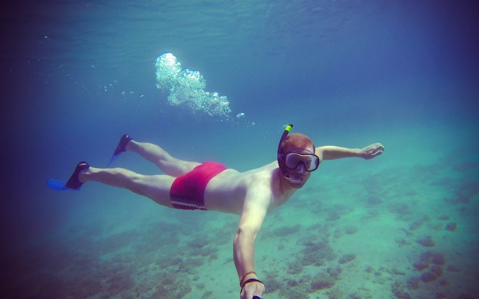 Snorkeler exploring underwater during Blue Lagoon, Ciovo & Trogir Speedboat Tour.