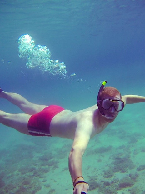 Snorkeler exploring underwater during Blue Lagoon, Ciovo & Trogir Speedboat Tour.