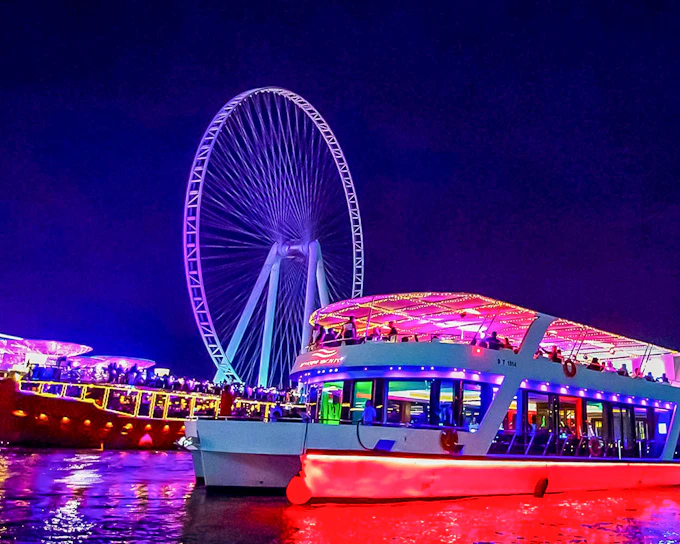 From Dubai Marina: 1.5-Hour Sunset/Dinner Cruise with Open Bar, Live Music & International Buffet