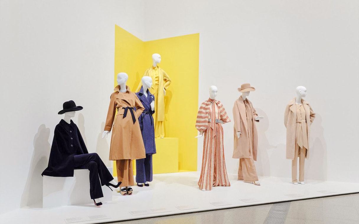 Mannequins displaying Martin Grant fashion designs at exhibition.