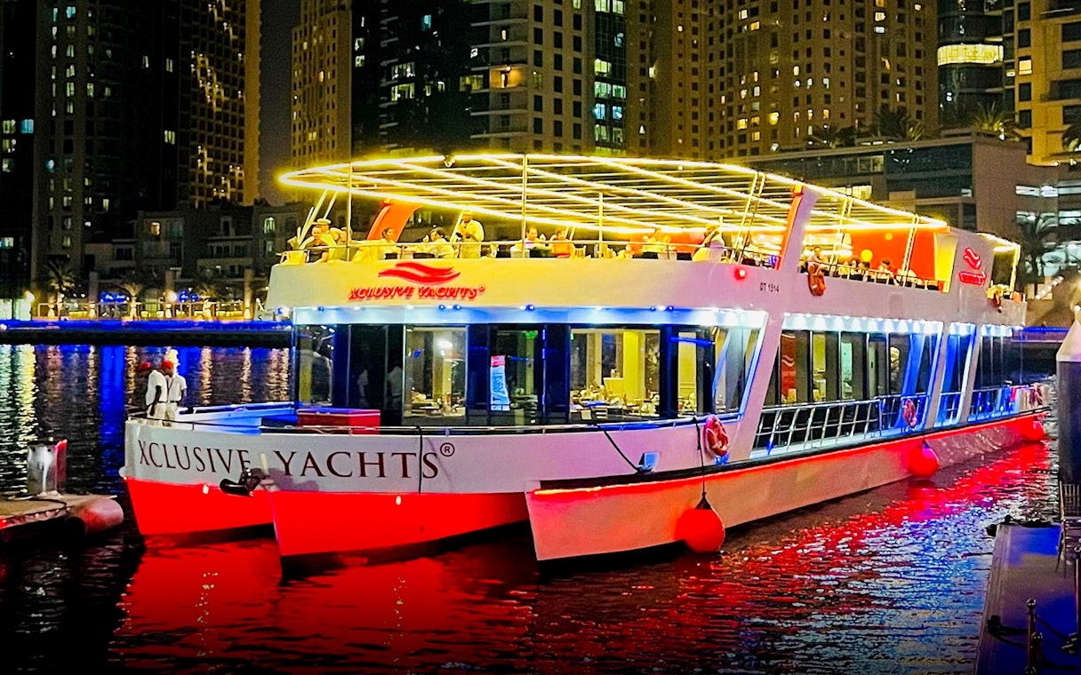 Luxury yacht docked at Dubai Marina for Ain Dubai & JBR New Year's Eve boat party.