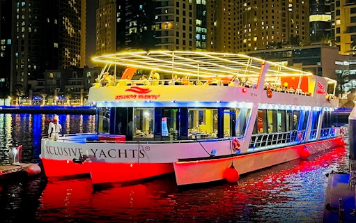 Luxury yacht docked at Dubai Marina for Ain Dubai & JBR New Year's Eve boat party.