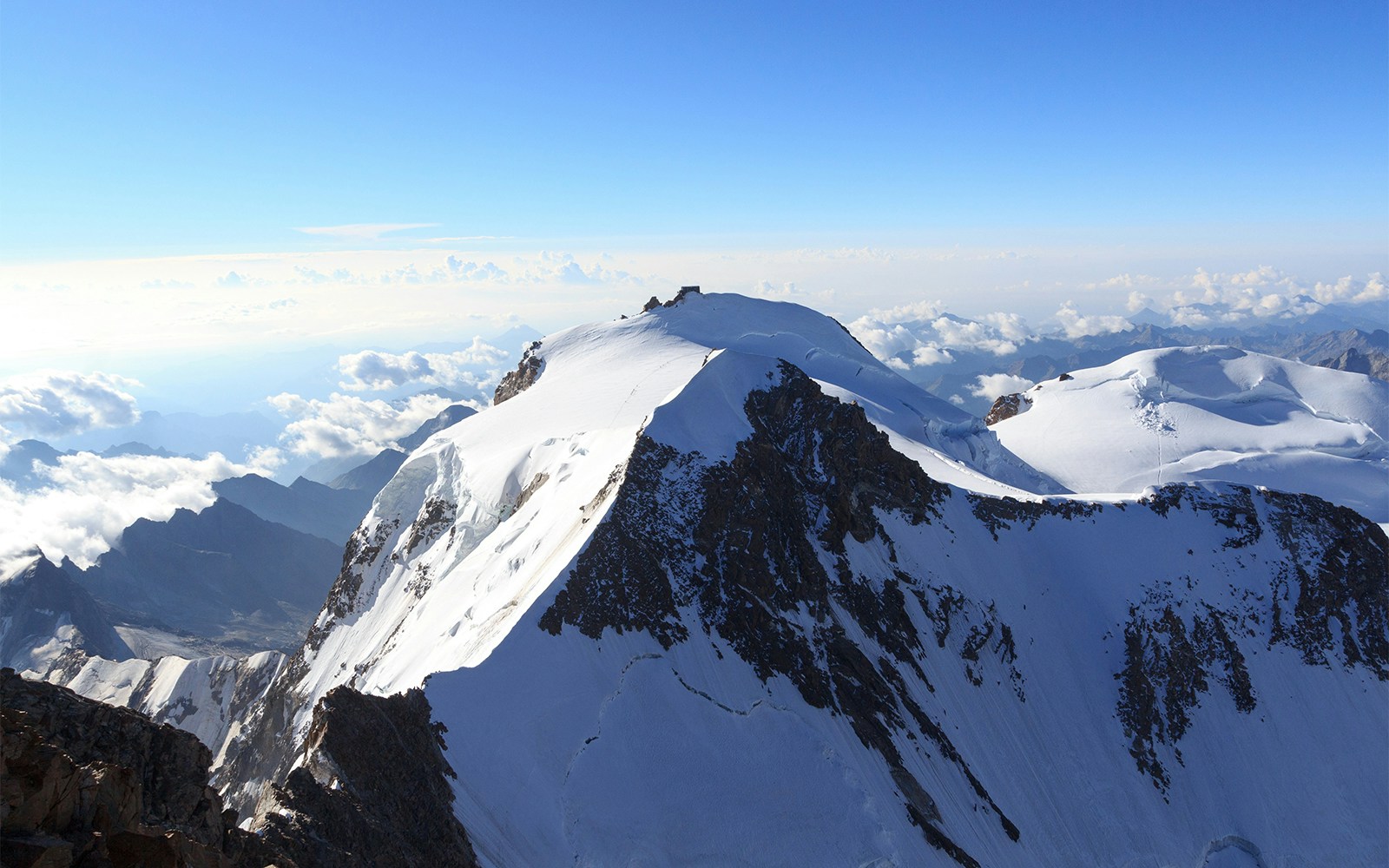 Signalkuppe with Margherita Hut on Monte Rosa massif in Pennine Alps, Switzerland.