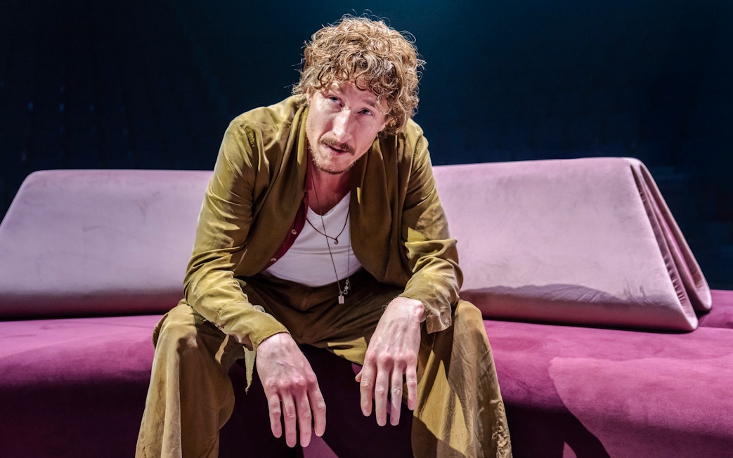 Performer on stage during Hunger Games West End show.