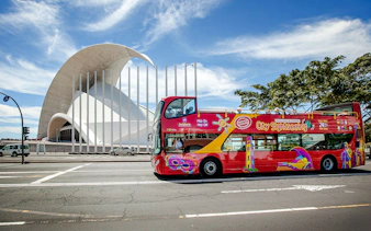 Santa Cruz hop-on hop-off bus in front of Auditorio de Tenerife.