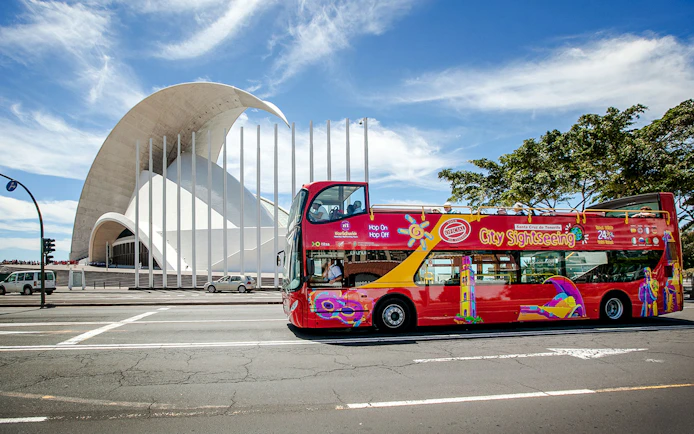 Santa Cruz hop-on hop-off bus in front of Auditorio de Tenerife.