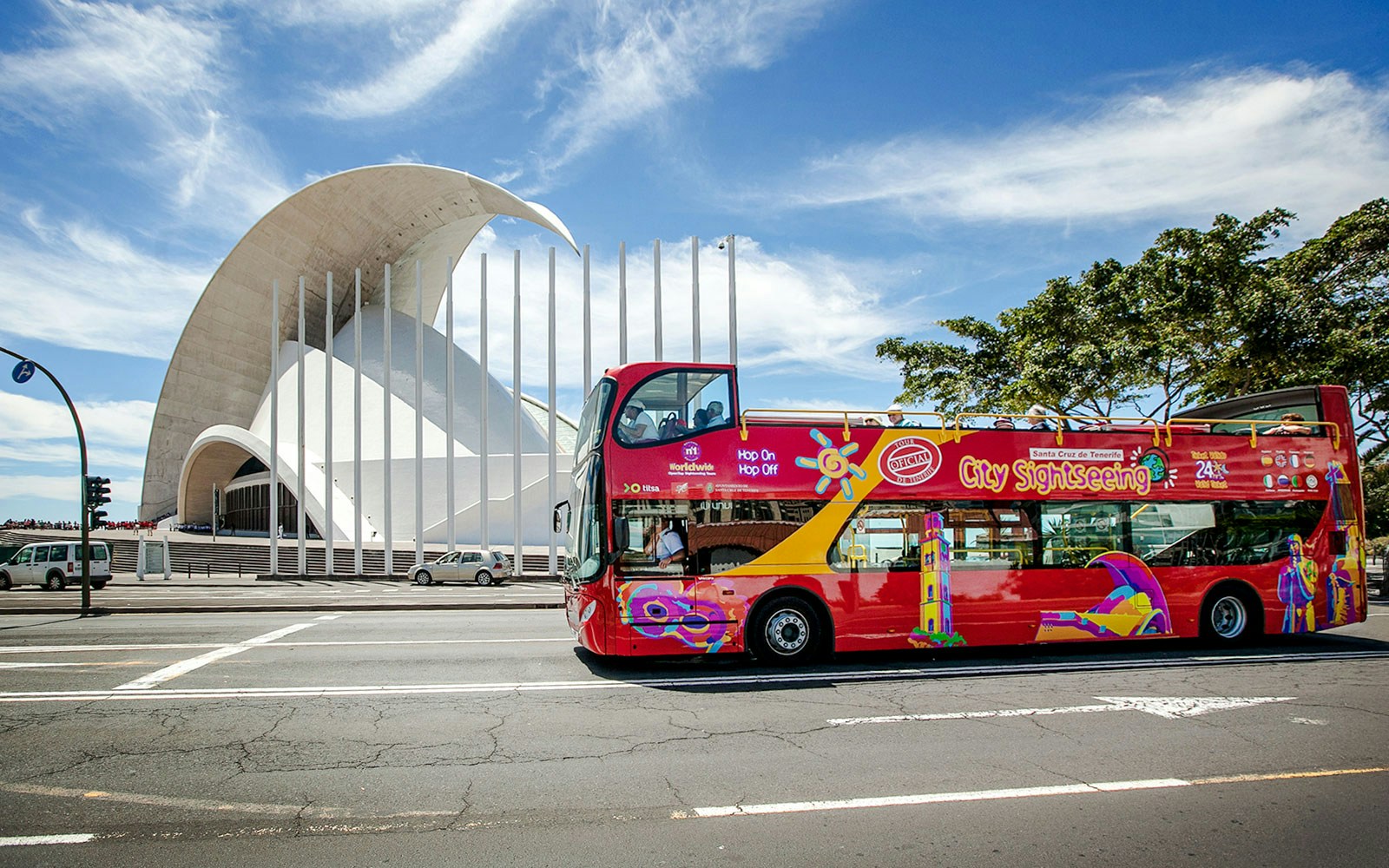 Santa Cruz hop-on hop-off bus in front of Auditorio de Tenerife.