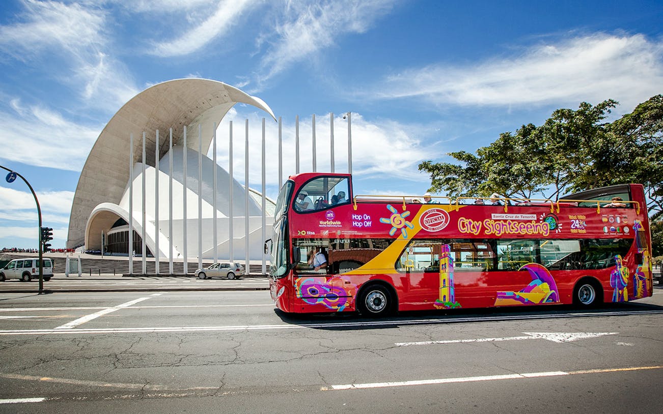 Santa Cruz hop-on hop-off bus in front of Auditorio de Tenerife.