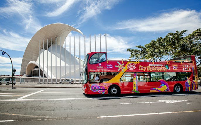 Santa Cruz hop-on hop-off bus in front of Auditorio de Tenerife.