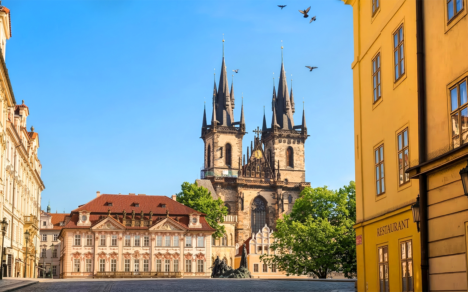 Old Town Square in Prague with Church of Our Lady before Týn in the background.