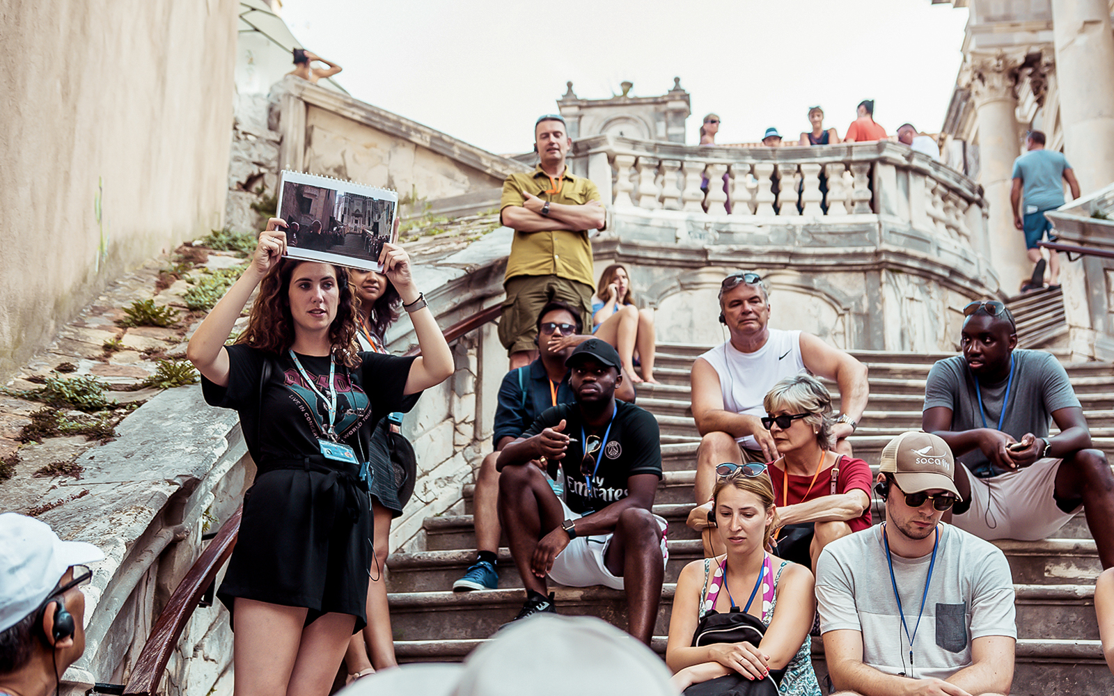 Tour group with guide on Dubrovnik steps, Game of Thrones "Walk of Shame" location.