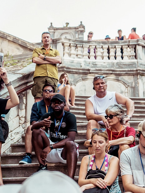 Tour group with guide on Dubrovnik steps, Game of Thrones "Walk of Shame" location.