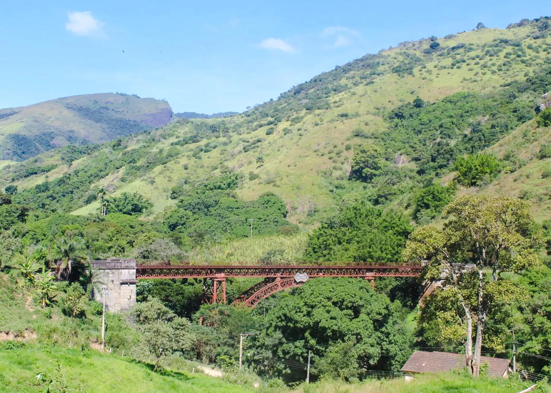 Historic railway bridge in lush Coffee Valley, Rio de Janeiro.