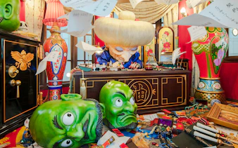 Ghibli Park Directors Room with character figure and colorful decor.