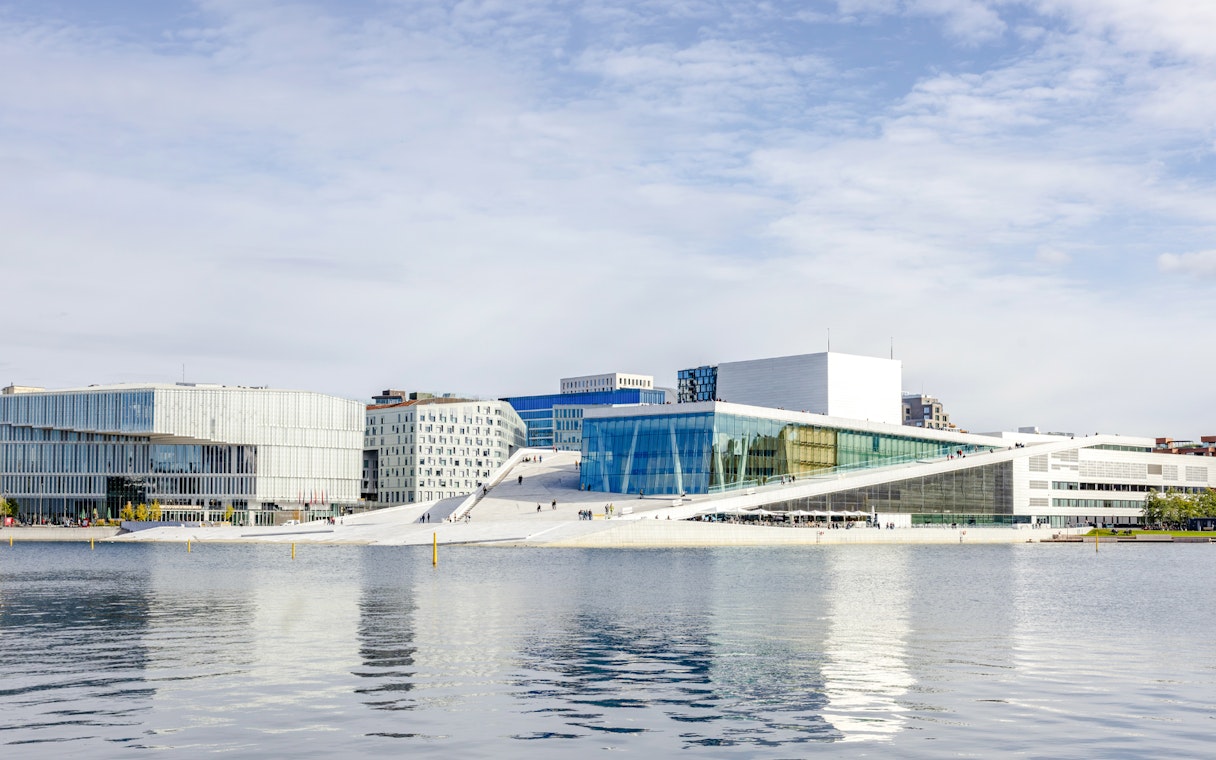 Oslo Opera House viewed from the water during a fjord sightseeing cruise.