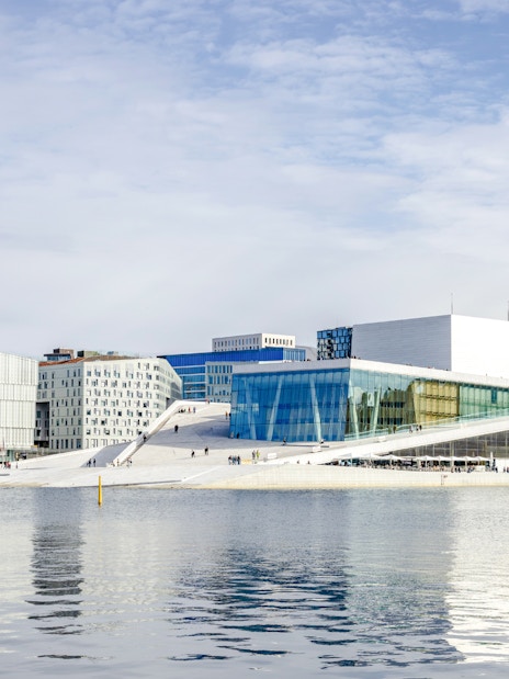 Oslo Opera House viewed from the water during a fjord sightseeing cruise.