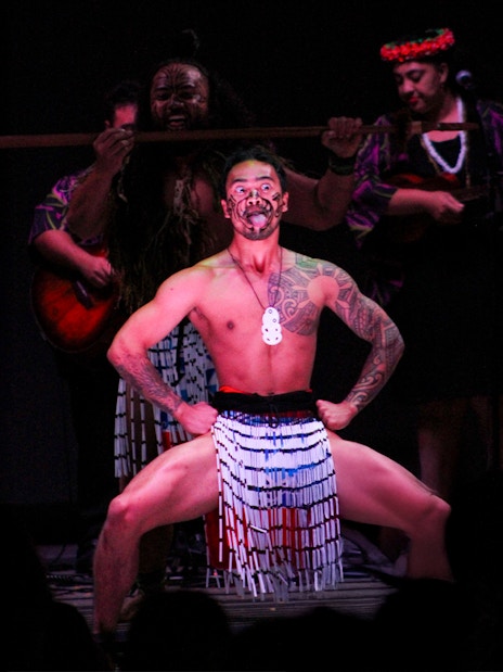 Performer at Moana Luau in Hawaii showcasing traditional Hawaiian dance.