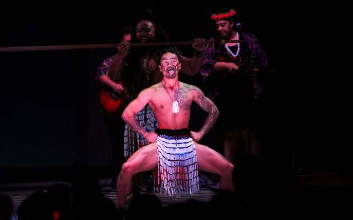 Performer at Moana Luau in Hawaii showcasing traditional Hawaiian dance.