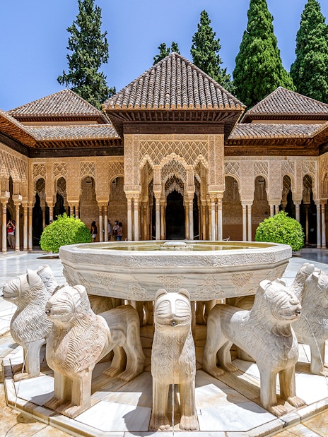 Court of the Lions fountain in Nasrid Palaces, Alhambra, Granada, Spain.