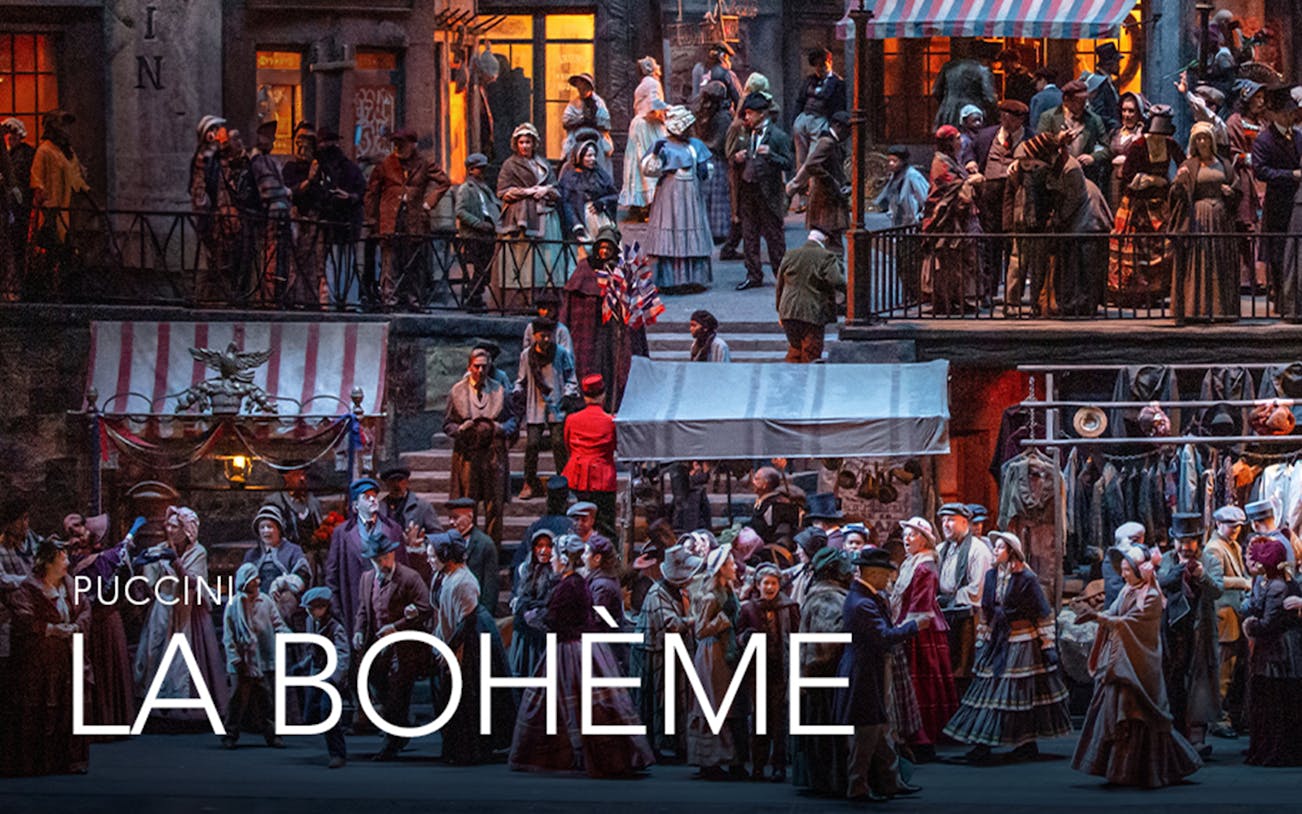 Crowd scene from Puccini's La Boheme opera with performers in period costumes.