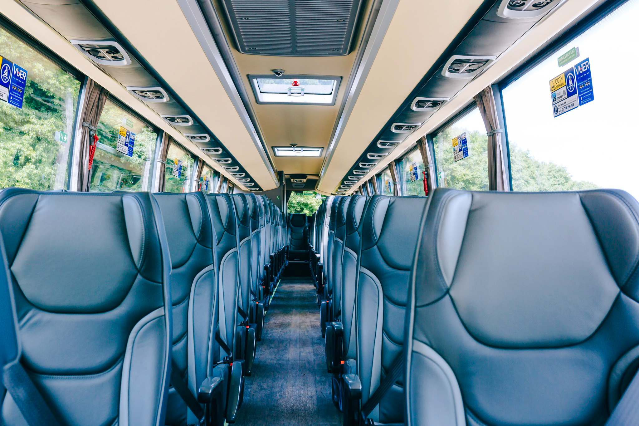 Interior of a bus used for transfers to and from London Victoria Station.