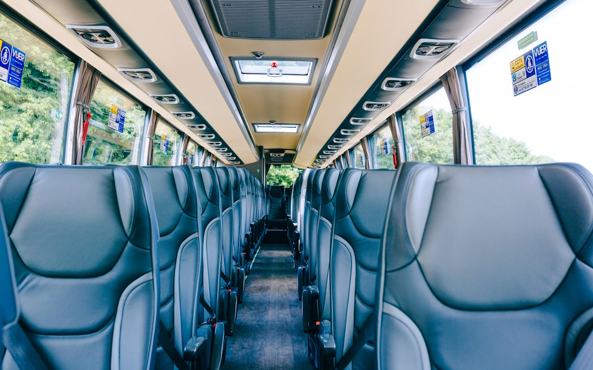 Interior of a bus used for transfers to and from London Victoria Station.