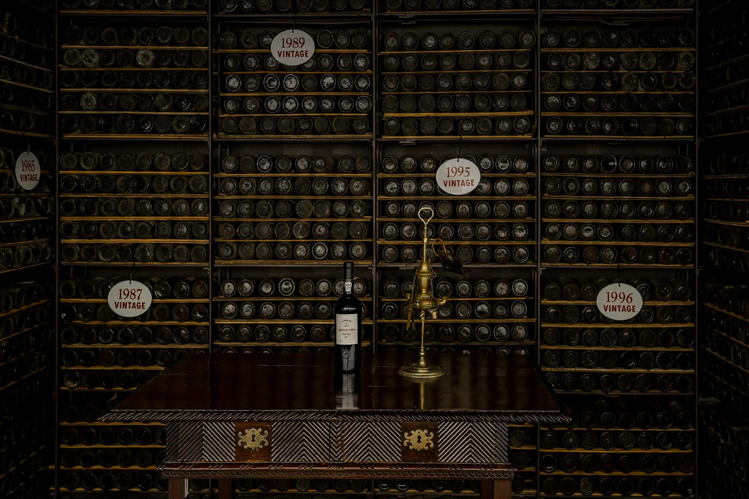 Ferreira Port Wine Cellar with vintage bottles and tasting setup in Porto.