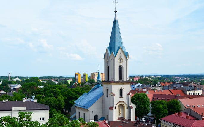 Church tower in a town near Auschwitz-Birkenau, Poland, seen during a guided tour from Warsaw.