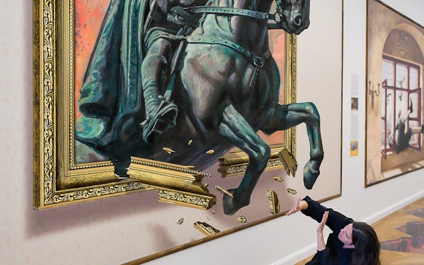 Horse sculpture emerging from frame at Illusion Art Museum, Prague.