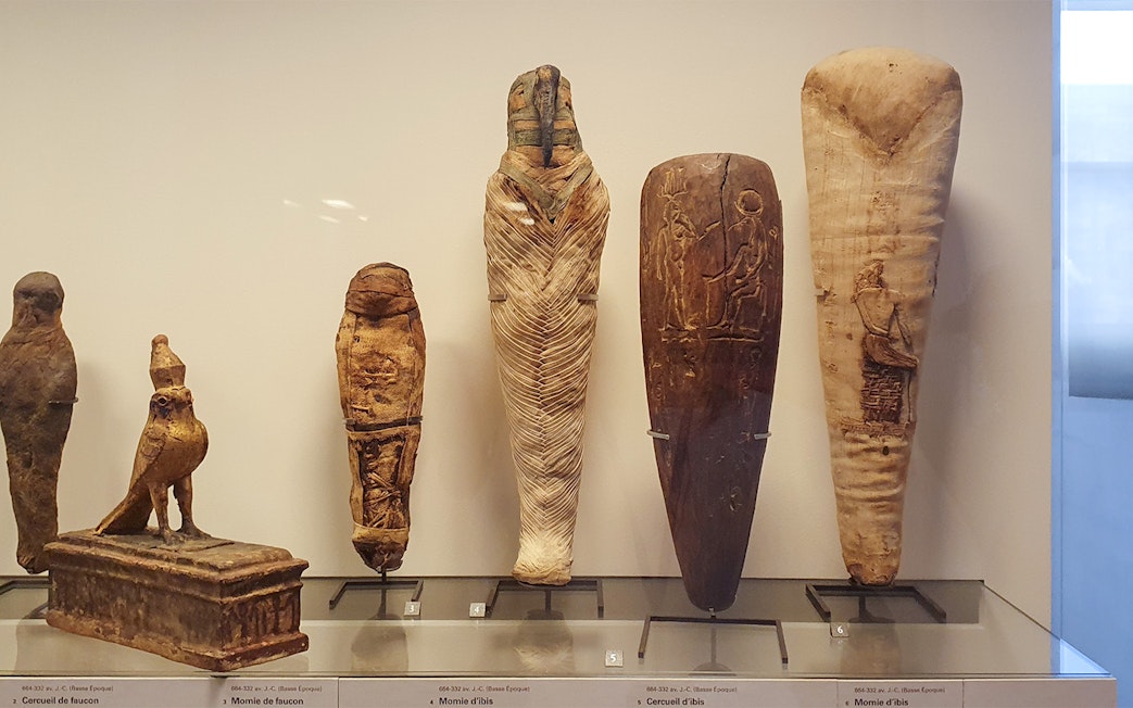 Ancient Egyptian artifacts displayed at the Louvre Museum in Paris, France.